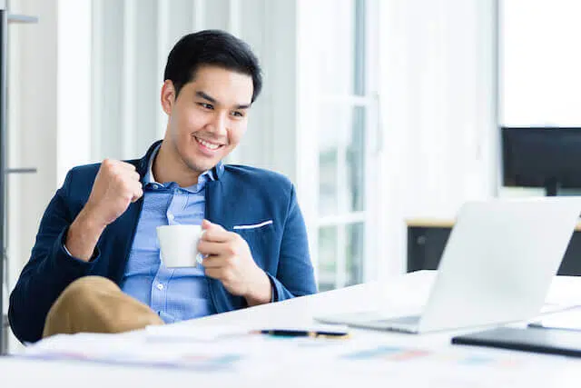 business man sitting on his desk